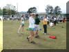 Meghan Stevens, left, with Diana Manee and Coach Abromitis, 2002 Outback Meet